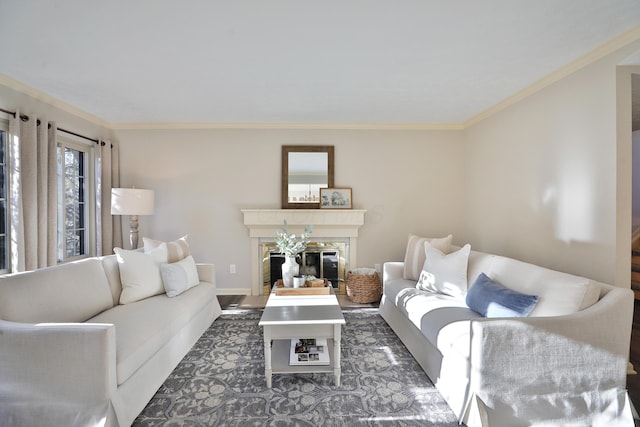 living room featuring a premium fireplace and crown molding