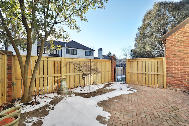 view of snow covered patio