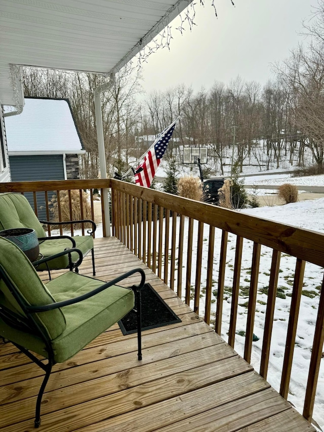 view of snow covered deck