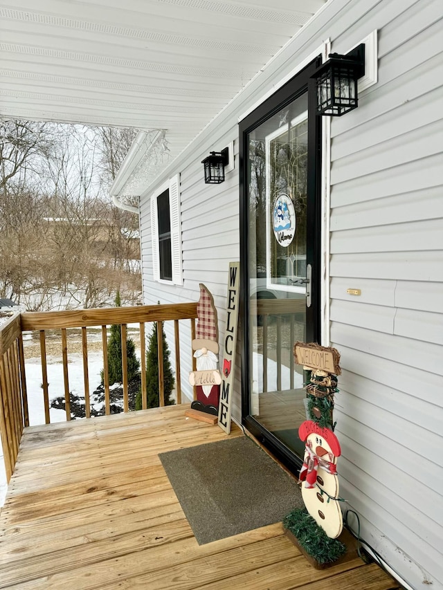 view of snow covered deck