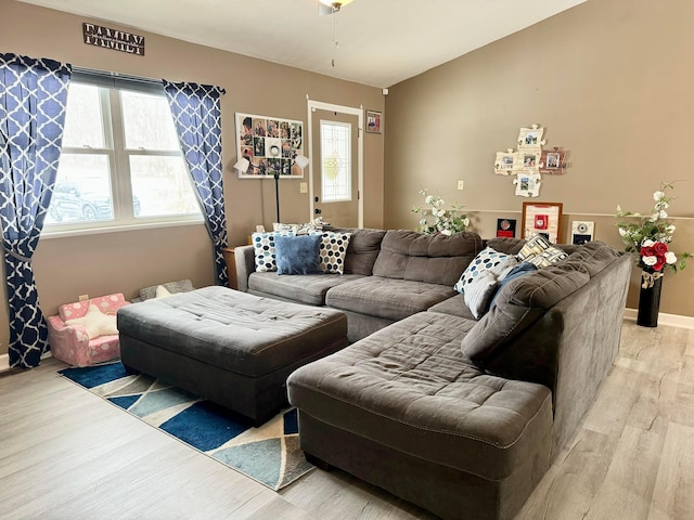 living room with light hardwood / wood-style flooring