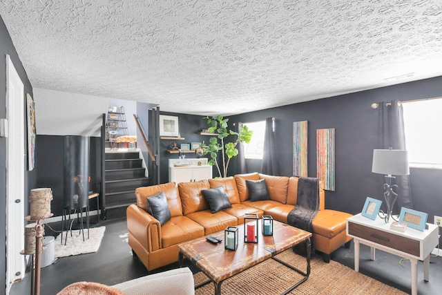 living room with a textured ceiling