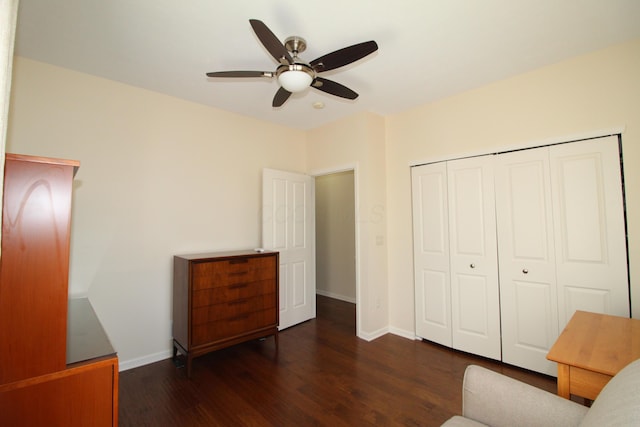 unfurnished room with ceiling fan and dark hardwood / wood-style floors