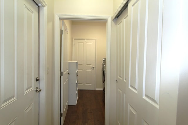 hallway with dark hardwood / wood-style floors