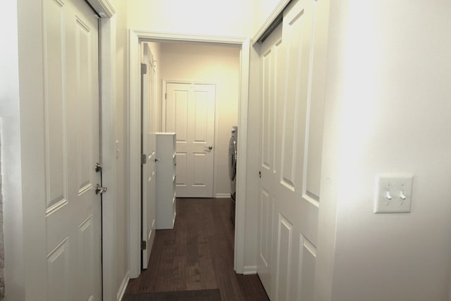 corridor featuring dark hardwood / wood-style floors