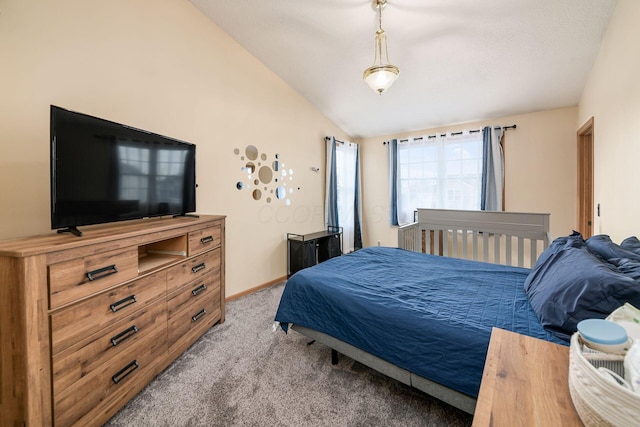 bedroom featuring vaulted ceiling and light carpet