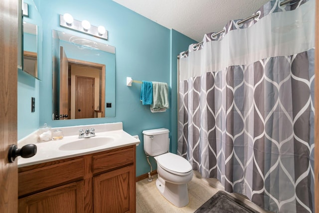 bathroom featuring vanity, toilet, a textured ceiling, and a shower with shower curtain