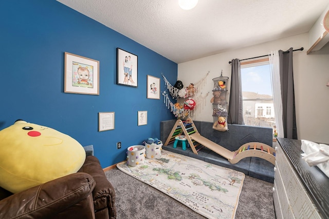 carpeted bedroom featuring a textured ceiling