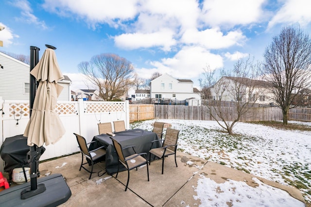 view of snow covered patio