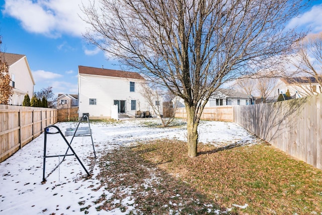 view of snow covered house