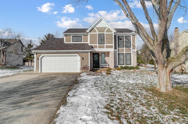 view of front of home with a garage