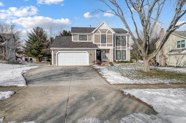 view of front of home with a garage