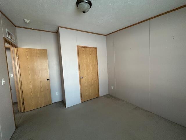 unfurnished bedroom featuring crown molding