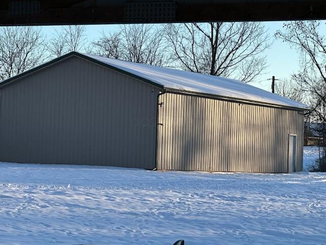 view of snow covered garage