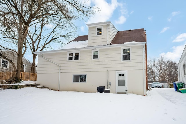 view of snow covered property