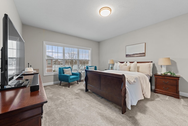 bedroom featuring light carpet