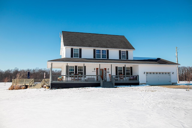 view of front of property with a garage and covered porch