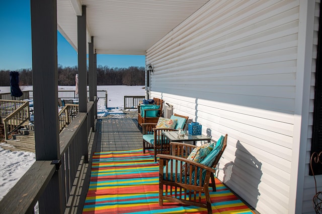 view of patio with a water view