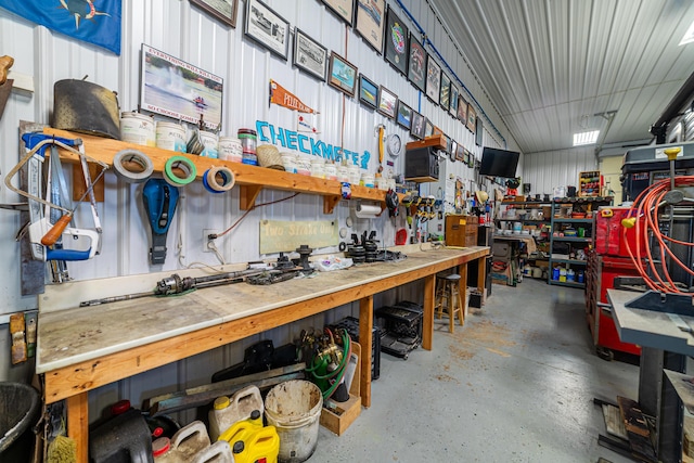 garage featuring a workshop area and concrete floors