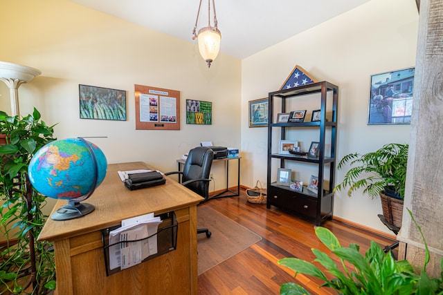 office area featuring dark wood-type flooring