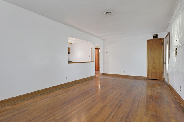 10 Main St, Orient, OH 43146 - spare room with hardwood / wood-style flooring, baseboards, and arched walkways