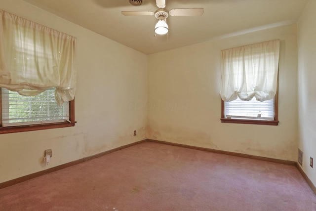 10 Main St, Orient, OH 43146 - spare room featuring light colored carpet, a ceiling fan, and baseboards