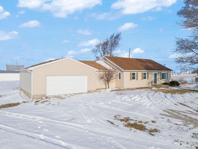 ranch-style house featuring a garage