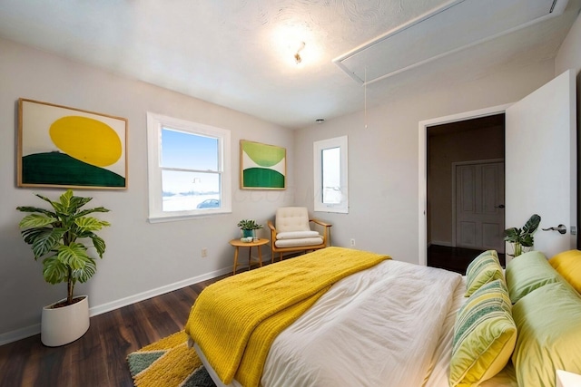 bedroom featuring dark hardwood / wood-style floors