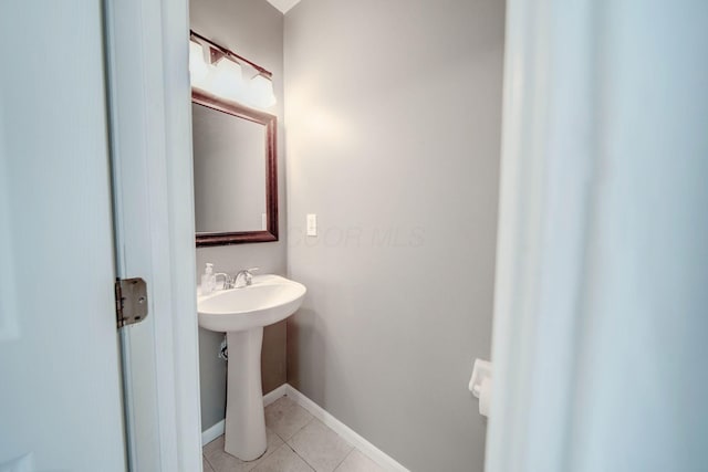 bathroom featuring sink and tile patterned floors