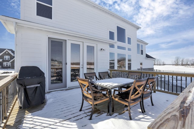 view of snow covered deck