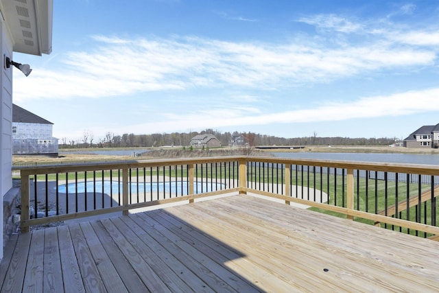 6764 Woodedge Ln, Hilliard, OH 43026 - wooden terrace with an outdoor pool and a water view