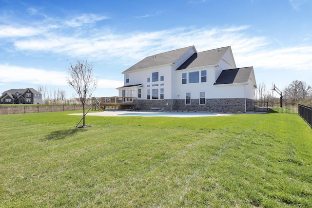 6764 Woodedge Ln, Hilliard, OH 43026 - rear view of house with a yard and fence