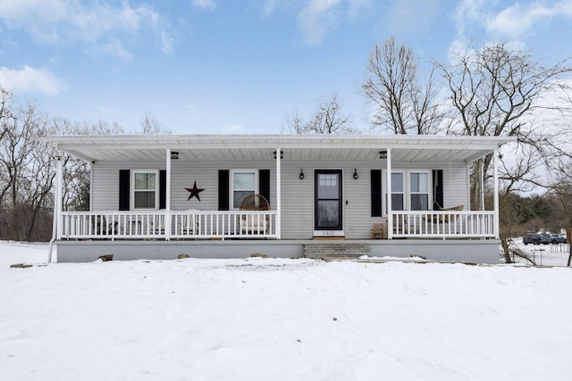 view of front of home featuring covered porch