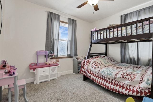 bedroom featuring ceiling fan and carpet flooring