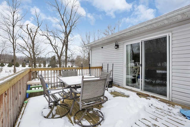 view of snow covered deck