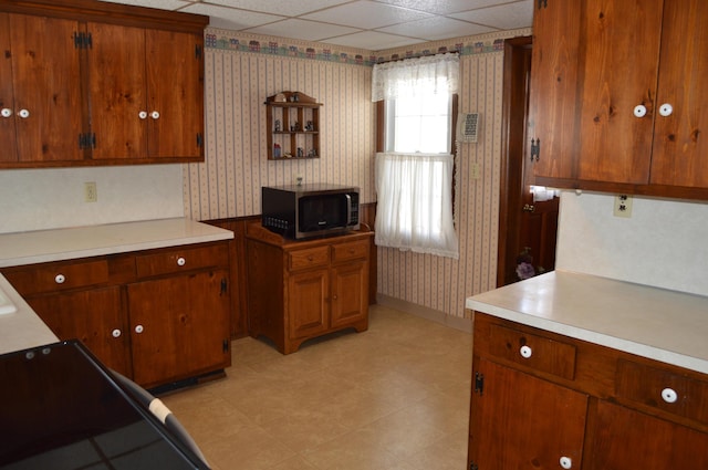 kitchen with a paneled ceiling