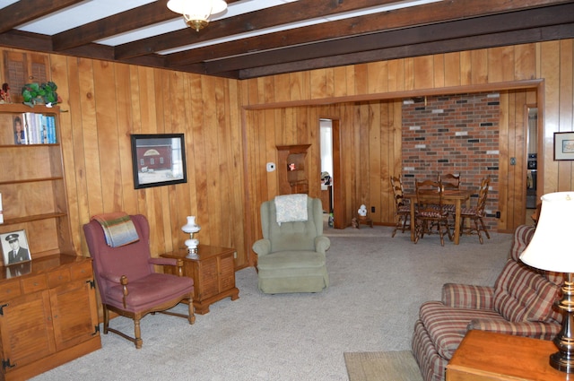 interior space featuring light colored carpet and beam ceiling