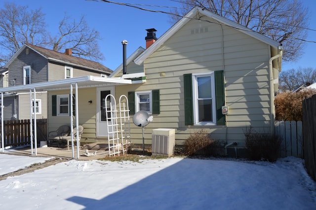 view of front of house featuring cooling unit