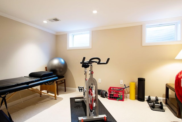 exercise area featuring baseboards, visible vents, carpet, crown molding, and recessed lighting