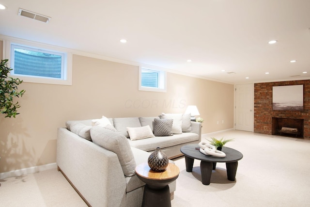 4580 Helston Ct, Columbus, OH 43220 - living room featuring baseboards, recessed lighting, a brick fireplace, light colored carpet, and ornamental molding