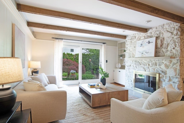 4580 Helston Ct, Columbus, OH 43220 - living area featuring beam ceiling and a fireplace