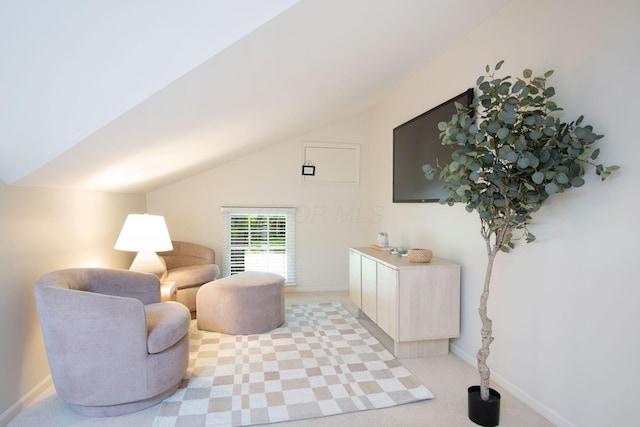 4580 Helston Ct, Columbus, OH 43220 - sitting room featuring lofted ceiling, light carpet, and baseboards