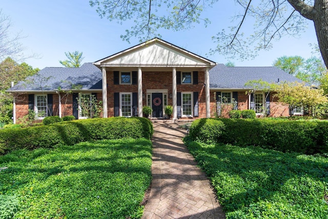 4580 Helston Ct, Columbus, OH 43220 - neoclassical home featuring brick siding and roof with shingles
