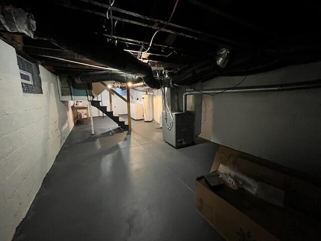 basement featuring heating unit