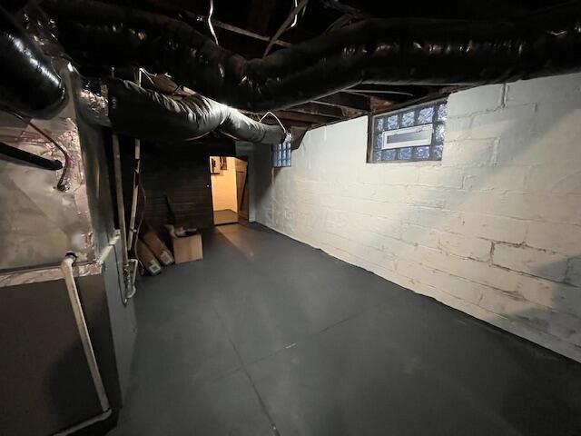 basement with heating unit