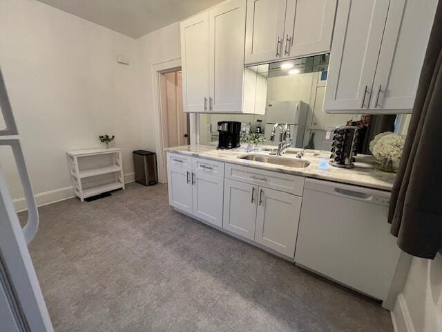 kitchen with dishwasher, white cabinets, and sink