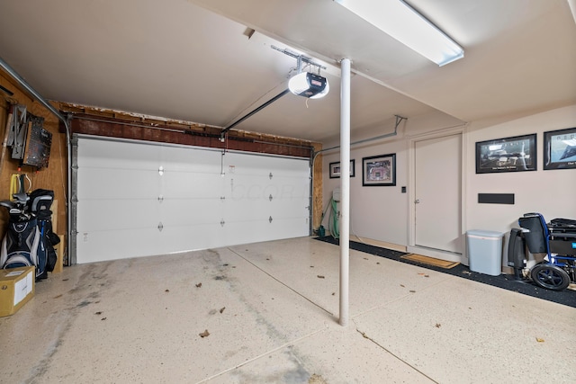 garage featuring a garage door opener