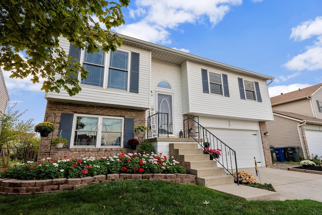 bi-level home featuring a garage