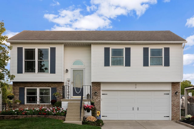 split foyer home featuring a garage