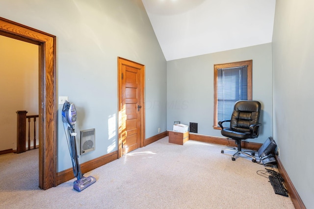 living area featuring carpet, heating unit, and lofted ceiling